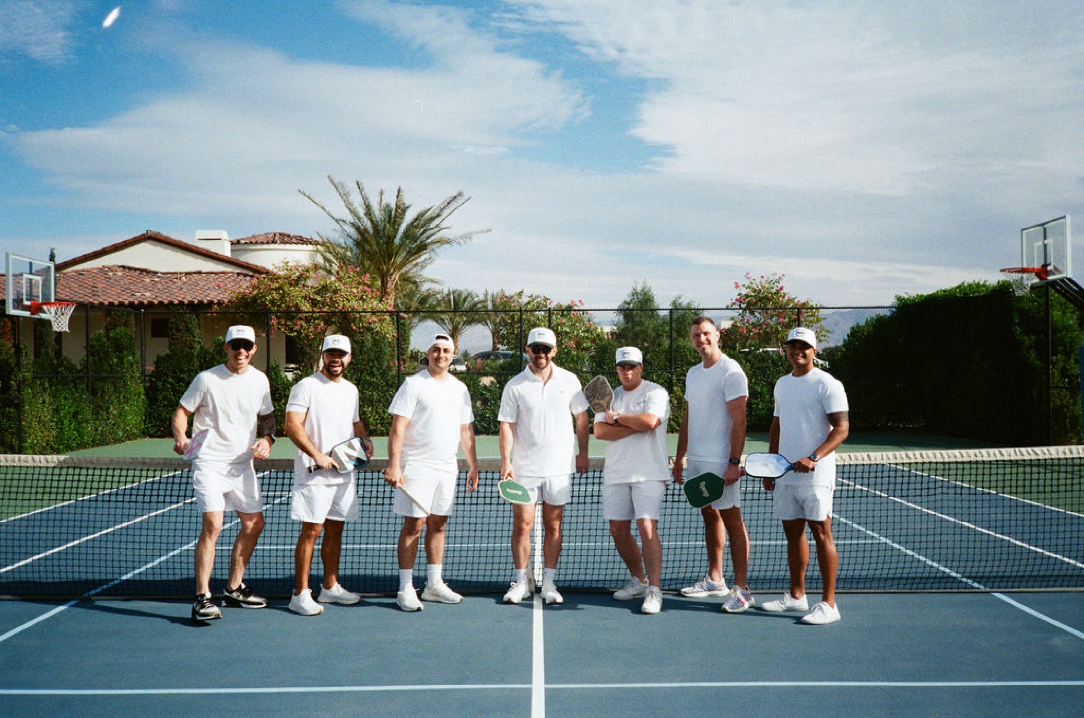 Guests enjoying tennis on the grounds